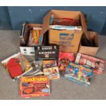 Two boxes of vintage toys, games and jigsaws. Includes The World of Thomas The Tank Engine Hornby