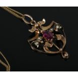 An Edwardian 9ct Gold Garnet and Pearl pendant, on 9ct box link chain. Total weight: 3.8g.