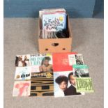A collection of vinyl records and singles of mainly pop examples including Chaka Chan, The Pointer