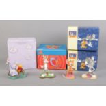 Four boxed Disney and Warner Bros. ceramic figures. To include Wedgwood Tom and Jerry and Bugs