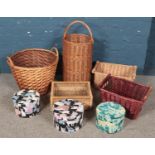 A quantity of mostly wicker baskets.