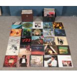 Two boxes of mainly rock and pop records. To include Michael Jackson, The Police, David Bowie, U2,