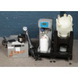 A collection of brewing equipment; including Eco-nomic hydrocarbon cooler and Modular 20 Keg holder.