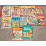 A quantity of mostly Disney & Looney Tunes annuals and books. Includes Tweety and Sylvester, Bugs