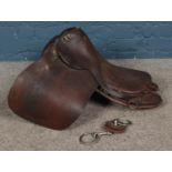 A William Christie of Station Street, Walsall leather saddle, with rein bit.