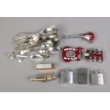 A quantity of collectables including guitar belt buckles, lighters, EPNS cutlery, etc.