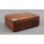 A Victorian brown leather, blue silk and velvet lined dressing case; with white metal mounts and