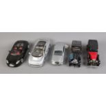 A collection of diecast cars including Franklin Mint 1:24 Precision models and Maisto examples.