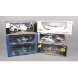 Six boxed 1/18 scale diecast racing cars including Revell Union Type C, Sun Star Porsche 911, Sauber