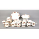 A collection of Royal Albert Old Country Roses including tea cups, salt and pepper shakers,