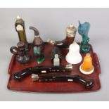 A tray of Avon scent/aftershave bottles including swordfish, pistols and horn examples.