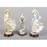 Three Florence Guiseppe Armani resin figures, comprising of 'Scarlett', 'Lady Jane' and 'Daisy'.