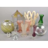 A quantity of glassware. Includes peach glass vases, glass hanging lantern, pierced vase, etc.