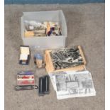 A box of assorted collectables including Parker pens, souvenir spoons, commemorative medallions,