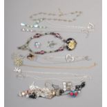 A collection of costume jewellery necklaces including beaded, floral and teddy bear examples.