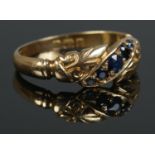 A Victorian 18ct Gold five stone sapphire ring. Assayed for Birmingham, 1899. Size MÂ½. Total