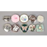 Ten flora and fauna themed compacts including Stratton and Korean examples.