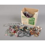 A quantity of assorted costume jewellery including necklaces, bracelets, etc.