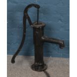 A cast iron water pump. (69cm)