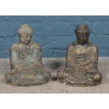 Pair of concrete seated Buddha garden ornaments. Approx. height 29cm.
