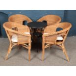 Four rattan tub chairs along with tin garden table.