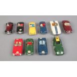 A collection of Dinky diecast racing cars including M.G Midget, Sunbeam Alpine, Triumph TR2,