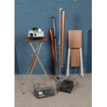 A collection of assorted electronics including Step Up and Down Transformer, Coomber tape