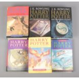 Six first edition Harry Potter books, containing four hardback examples including Harry Potter and