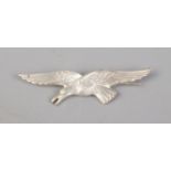 A silver pin brooch in the form of a flying bird. Hallmarked Birmingham 1920 by Turner & Simpson.