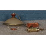 A retro brass and wooden light fitting.