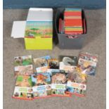 A large collection of Disney Animal World books including boxed set and some packaged with figures.