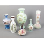 A collection of Victorian coloured glassware including painted floral examples.