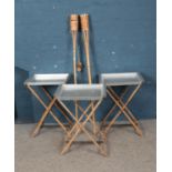 A quantity of bamboo items including pair of Tiki torches and three folding tables.