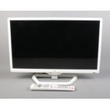 A JVC 24" TV model LT-24C241. With remote.
