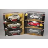 Six boxed Premier Collection 1/18 scale diecast cars including Porsche 911, Chrysler GT Cruiser,