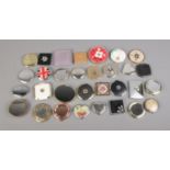 A large collection of assorted compacts to include floral, Nottingham Forest, embroidered