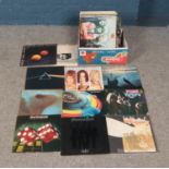 A collection of vinyl records of mainly pop and rock examples to include Pink Floyd, Led Zeppelin,