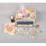 A box of assorted costume jewellery including brooches, watches, necklaces, earrings, etc.