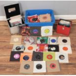 Three boxes of single records. Includes T-Rex, Queen, Kate Bush, etc.