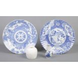 Four pieces of Oriental blue and white porcelain. Includes Japanese charger along with another