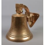A bronze ship's bell inscribed Metal From HMS Tiger, Jutland 1916. Height 21cm, Diameter of bell