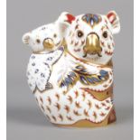 A Royal Crown Derby porcelain paperweight from The Australian Collection, Koala and Baby. Designed