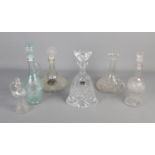 A Royal Doulton crystal glass decanter along with cut glass and other glass decanters.