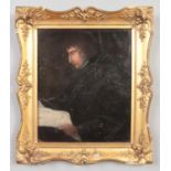 A 19th century gilt framed oil on board. Portrait of a gentleman reading. 27cm x 22cm.