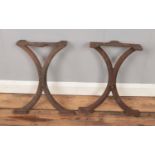 A pair of 19th century cast iron bench supports. Marked for T Larmuth, Sidebotham Patentee.