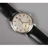 A gents stainless steel Omega manual wristwatch. With silvered dial, baton markers and subsidiary