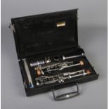 A cased Woodwind Company and Crampon & Cie of Paris Clarinet, with reed and 'Cork Grease'