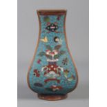 A small Chinese Fanghu shape cloisonne vase. Height 12.5cm. Some enamel loss. One small dent to