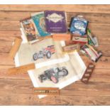 A box of games and other collectibles including Dominoes, Cribbage board and harmonicas. Also to