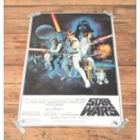 A Reproduction 1977 Star Wars film poster. 92cm x 61cm.